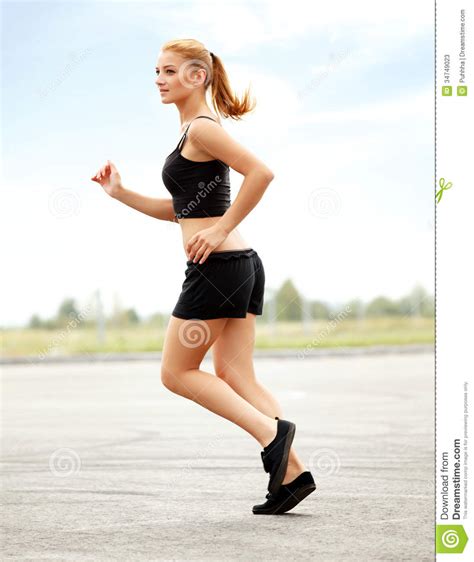 Athletic Runner Training In A Park For Marathon. Fitness Girl Stock Photos - Image: 34749023