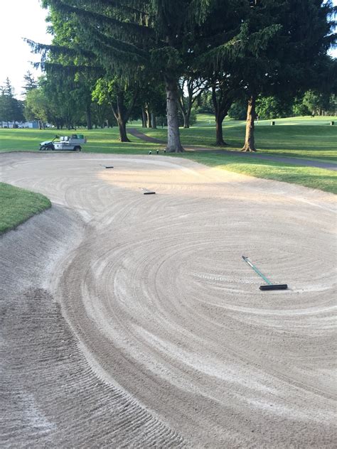 Bellevue Grounds: Bunker Rake Placement In The Middle Of Bunkers.