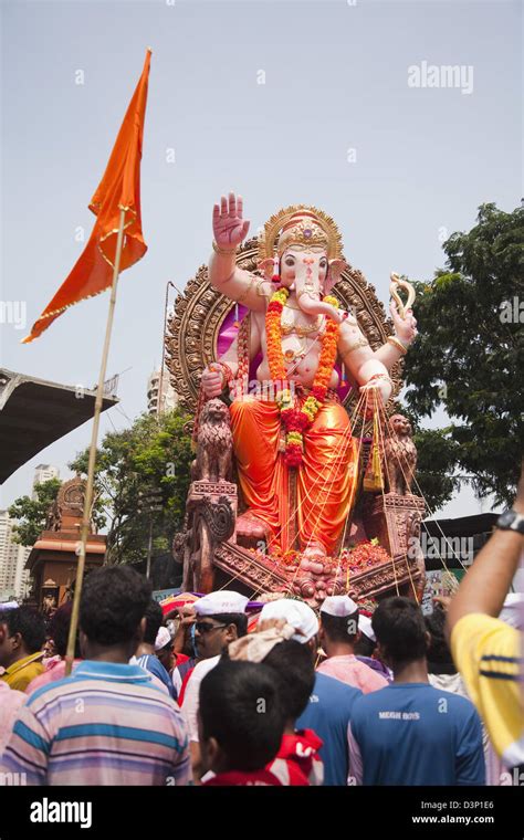 People at religious procession during Ganpati visarjan ceremony, Mumbai, Maharashtra, India ...