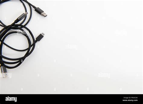 White desk with various USB cables Stock Photo - Alamy