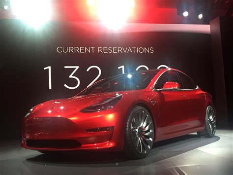 Candy Red Model 3 with the new nose | from the unveiling eve… | Flickr
