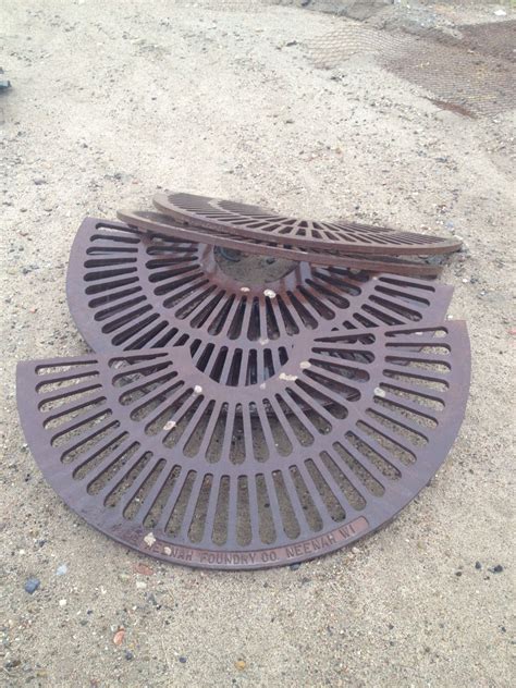 50" iron tree surrounds for use as French drain covers near back patio. Reuse! Outdoor ...