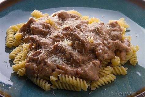 Beef Stroganoff over noodles | Adventures in Thyme