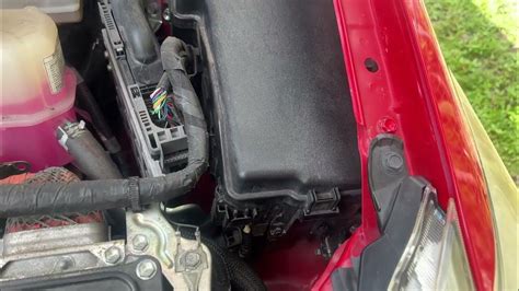 where to hook up jumper cables on a prius