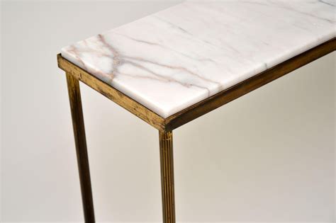 Brass marble console table OnlyFans channel