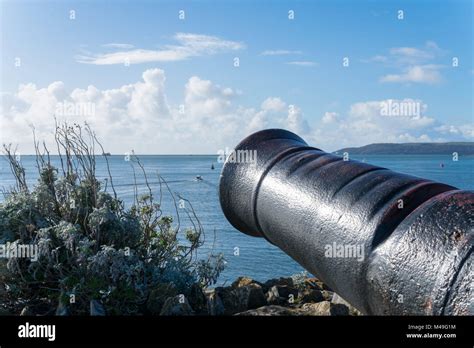 Cannon in front of drakes island plymouth uk hi-res stock photography