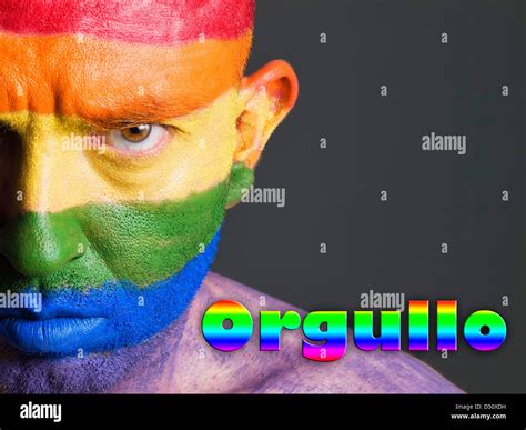 Hombre Con La Bandera Gay Pintada En La Cara Y Con Una Expresion Seria La Palabra Orgullo Esta