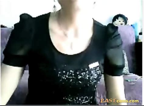 Chinese MILF Flashes In Black Dress