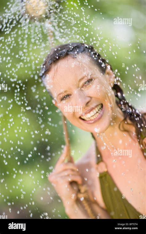 Woman In Bikini Showering Outdoors Hi Res Stock Photography And Images