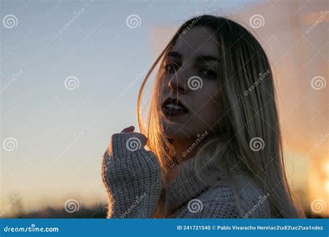 Portrait Of Beautiful Blonde Girl With Look At City Sunset Stock Photo Image Of Blonde
