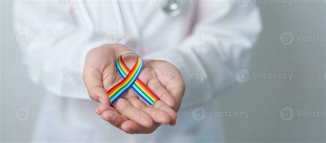 Doctor With Lgbtq Rainbow Ribbon For Support Lesbian Gay Bisexual Transgender And Queer