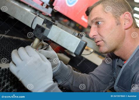 portrait man fixing machine stock photo image  department working