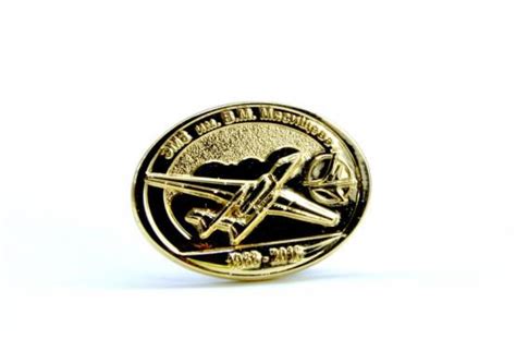 Металлические значки на заказ