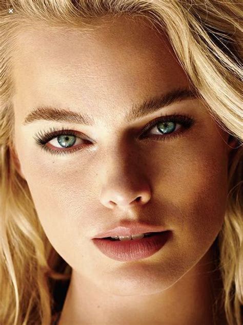 Beautiful Blonde Woman With Blue Eyes