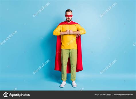 Full size photo of young handsome serious powerful super man in red ...