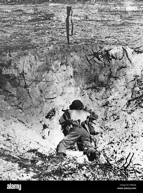 World War Ii Marine 1944 Na Dead Us Marine Lies In A Shell Hole