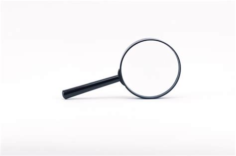 Premium Photo Close Up Of Magnifying Glass On White Background