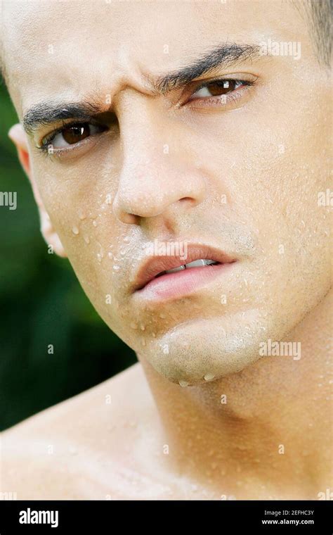 Portrait Of A Young Man Looking Serious Stock Photo Alamy