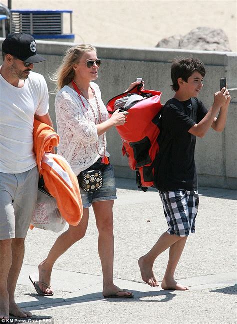 LeAnn Rimes Shows Off Her VERY Pert Derriere In Bikini Bottoms As She Enjoys A Beach Holiday In