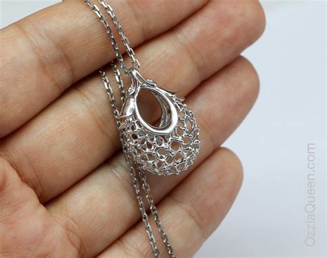 Необычный кулон Ягодка, родированное серебро 925 пробы, без камней.