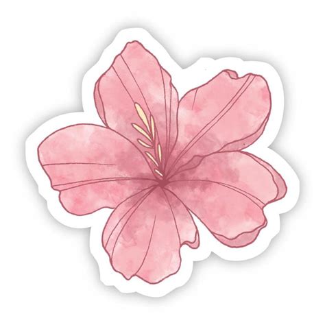 a pink flower sticker with watercolor paint on the back and bottom half ...