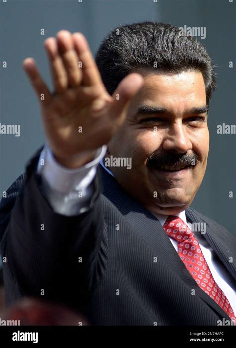 Venezuela S President Nicolas Maduro Waves As He Arrives At The