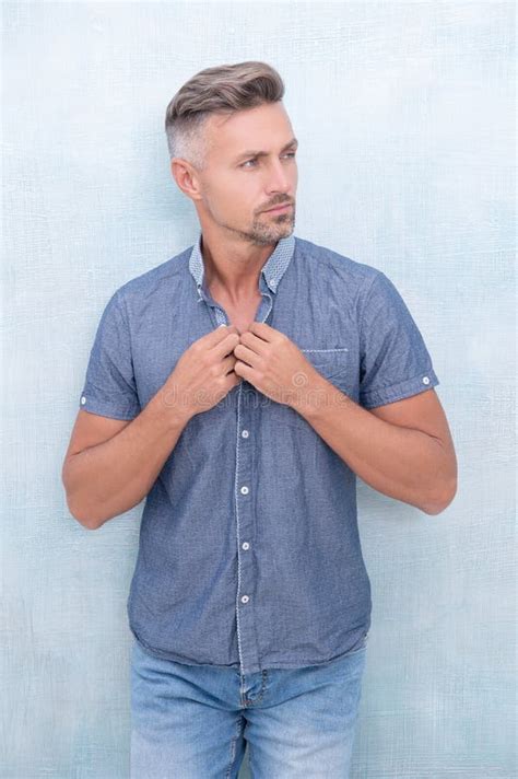 Caucasian Mature Guy Wearing Shirt On Background Photo Of Caucasian Mature Guy Stock Photo