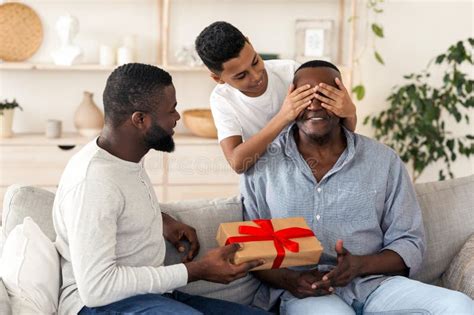 Grandfather X27 S Birthday Mature Black Man And His Son Congratulating Grandad Stock Image