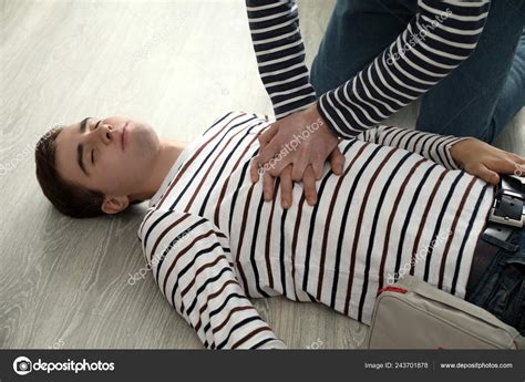 Woman Providing First Aid Her Unconscious Husband Home — Stock Photo