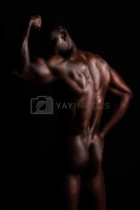 Naked Nude And Body Of A Strong Black Man In Dark Studio For Art Muscle Power And Sexuality