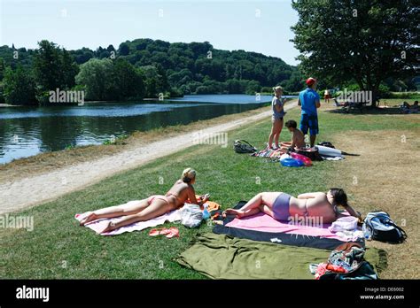 Ruhrlandschaft Zwei Maedchen Im Bikini Liegen Auf Einer Liegewiese Stock Photo Royalty Free
