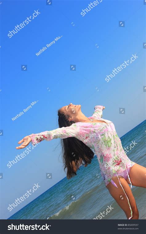 Стоковая фотография Sexy Bikini Model Posing On Beach Shutterstock