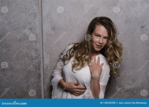 Stunning Blonde In A White Dress In Studio Stock Photo Image Of Fashionable Lady