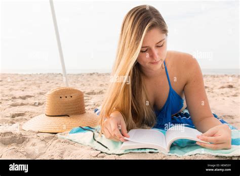 Woman Beach Bikini Lying Down Hi Res Stock Photography And Images Alamy