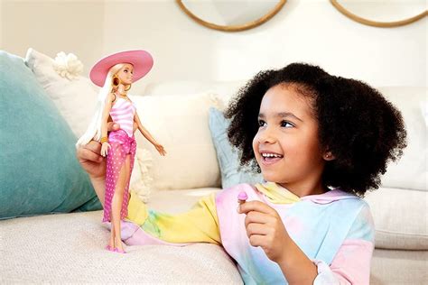 Blonde Barbie Doll With Swimsuit And Beach Themed Accessories