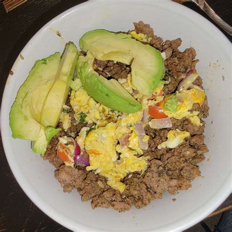 Ground beef, egg scrambled with veggies and topped with avocado and