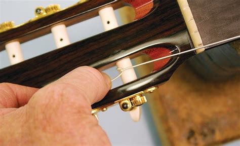 How To String A Guitar Super Easy Steps Sharpens