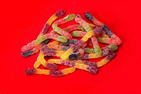 Jelly Worms Sweets On Red Background Stock Photo Image Of Gummy