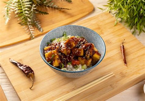 Premium Photo | Stir fried tofu with spicy sauce