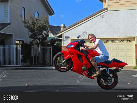 Wheelie On Motorcycle Image & Photo (Free Trial) | Bigstock