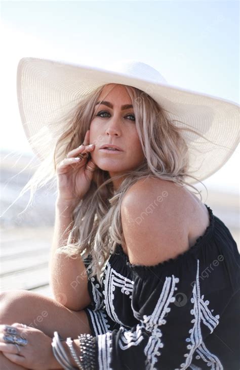 Beautiful Blonde Haired Woman Dressed In Bohemian Style At The Beach Photo Background And