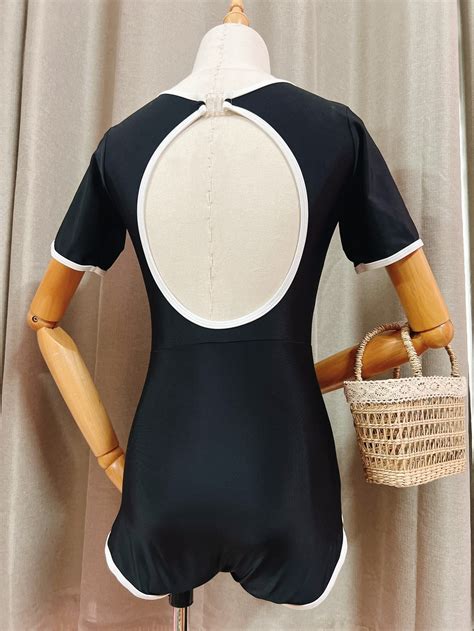 Bikini mảnh Đồ bơi nữ liền mảnh CÀI KHÓA SAU khoét lưng màu đen viền trắng sporty nhiều kiểu