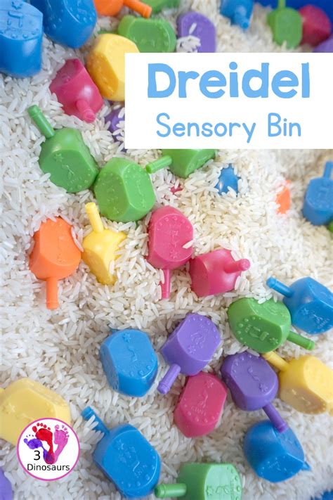 Dreidel Sensory Bin With Rice Dinosaurs