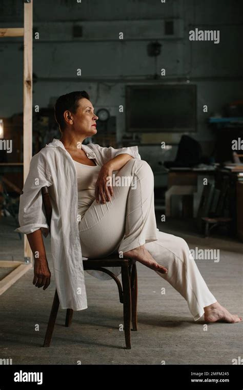 A Mature Woman Poses In A Film Studio Stock Photo Alamy