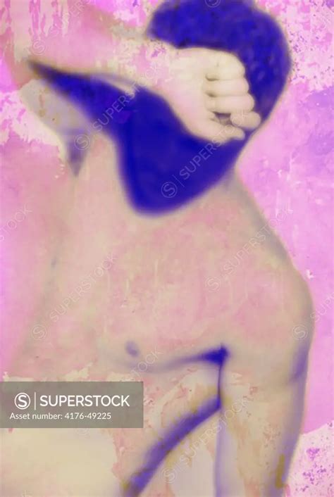 Naked Man Holding Up His Hand SuperStock