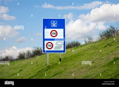 french autoroute motorway speed limit sign showing weather restrictions