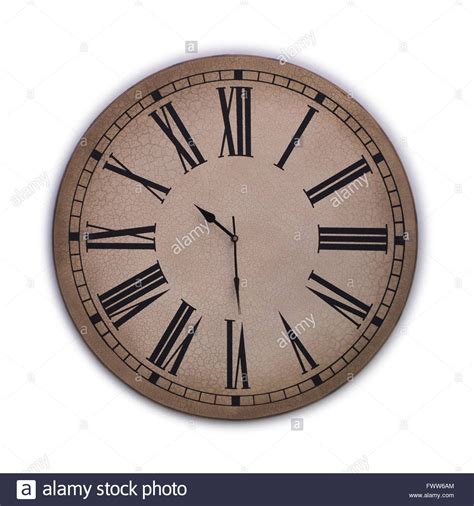 Descargar esta imagen Antiguo reloj con números romanos sobre un fondo