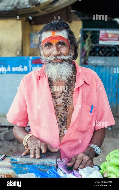 Distinctive Hindu Holy Man Street Vendor With Face Markings Big Grey