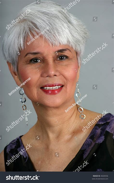Portrait Of Attractive Mature Woman Elegantly Dressed Stock Photo 4020556 Shutterstock