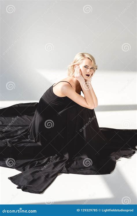 Beautiful Blonde Girl Posing In Elegant Black Dress Stock Image Image